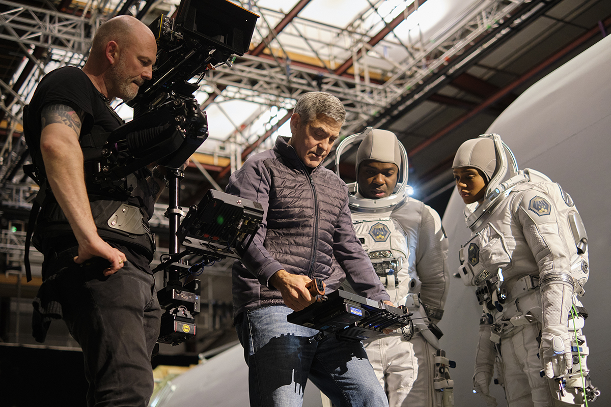 Director George Clooney on set at Shepperton Studios with David Oyelowo and Tiffany Boone on the set of “The Midnight Sky,” image by Philippe Antonello, courtesy of Netflix