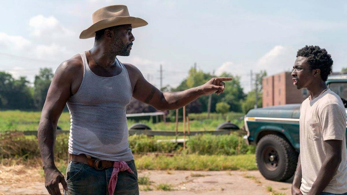 Idris Elba and Caleb McLaughlin in “Concrete Cowboy.” Cr: Netflix