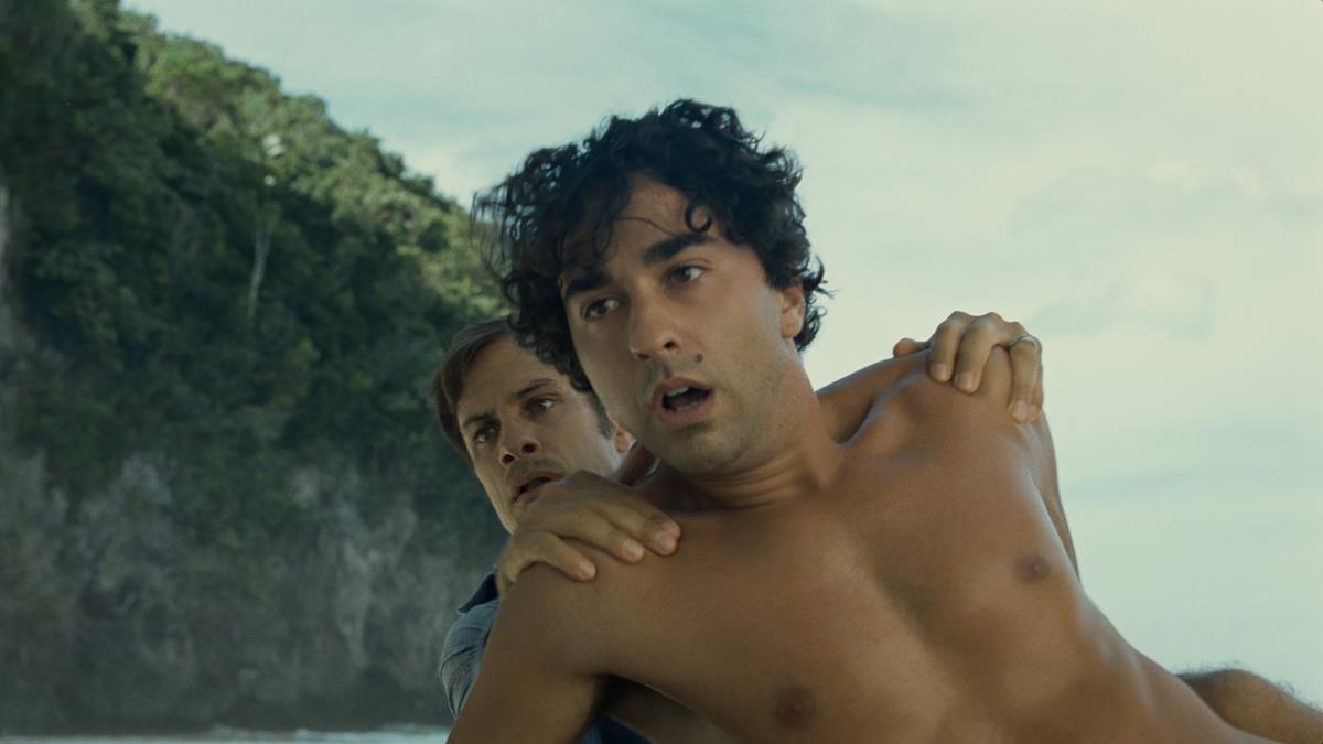 Guy (Gael García Bernal) and Trent (Alex Wolff) in writer-director’s M. Night Shyamalan’s “Old.” Cr: Universal Pictures