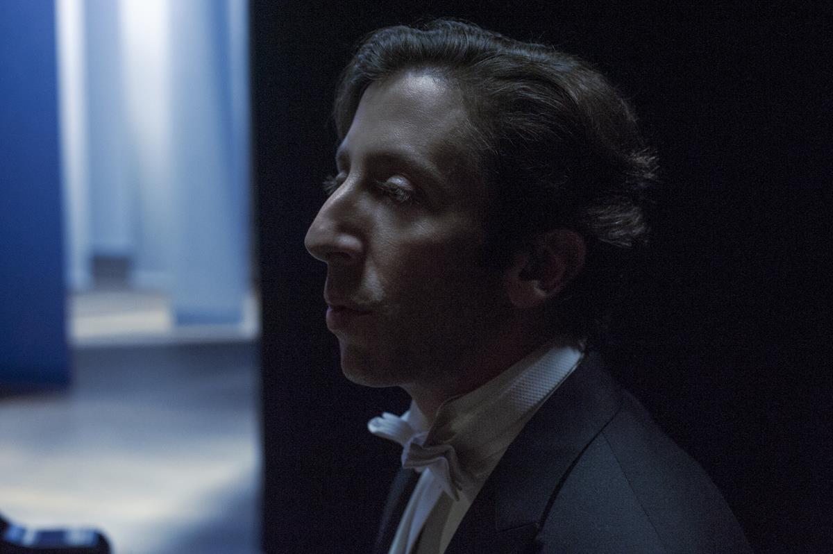 Simon Helberg as The Conductor in director Leos Carax’s “Annette.” Cr: Kris Dewitte/Amazon Studios