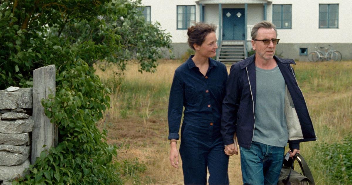 Vicky Krieps as Chris and Tim Roth as Tony in Mia Hansen-Løve’s “Bergman Island.” Cr: IFC Films