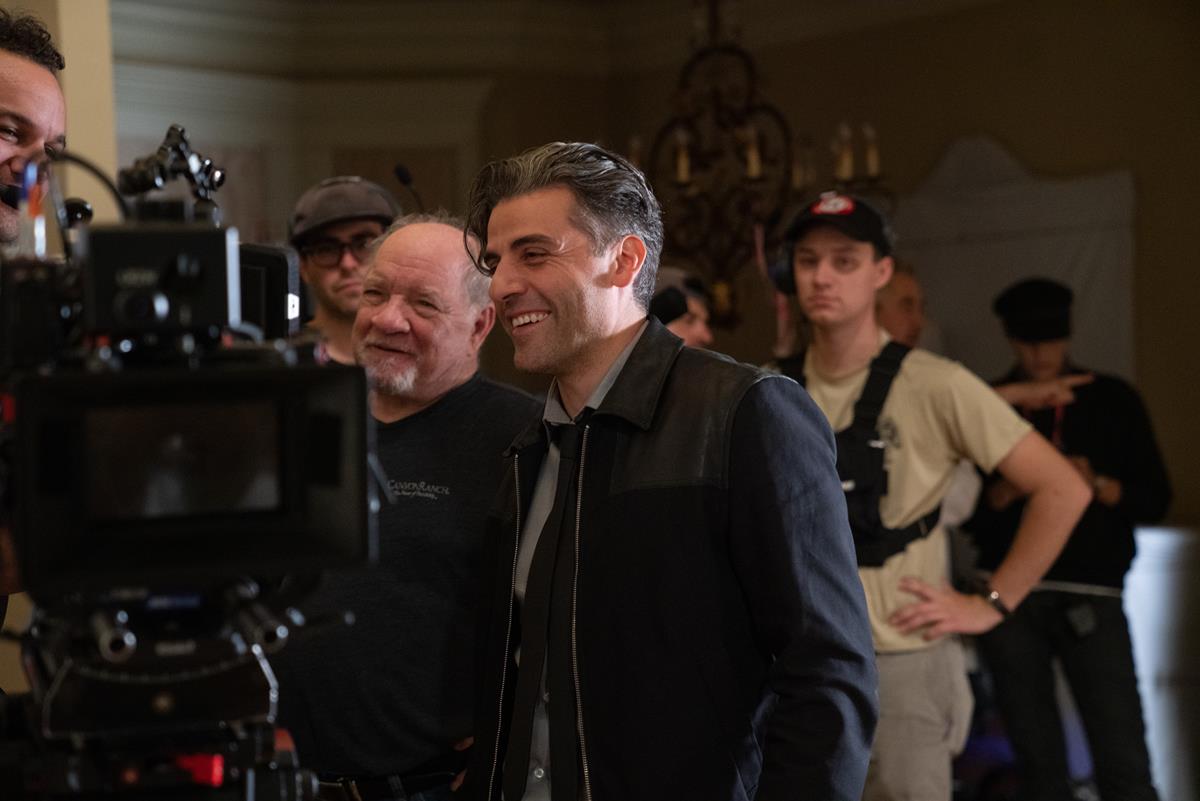 Director Paul Schrader and Oscar Isaac on the set of “The Card Counter.” Cr: Focus Features