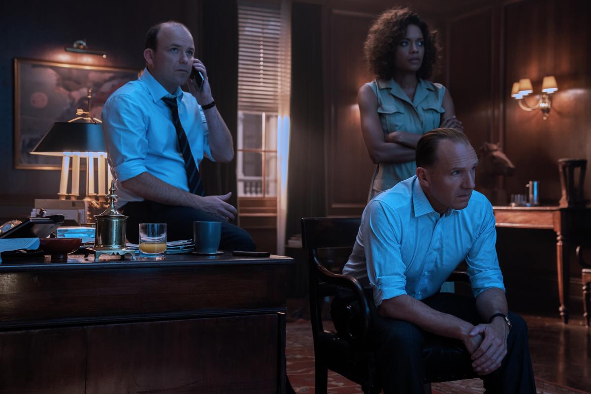 Rory Kinnear as Tanner, Naomie Harris as Moneypenny, and Ralph Fiennes as M in “No Time To Die.” Cr: MGM