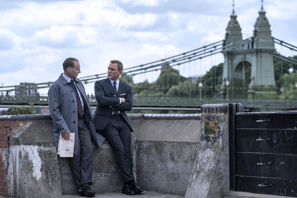 Ralph Fiennes as M and Daniel Craig as James Bond in “No Time To Die.” Cr: MGM