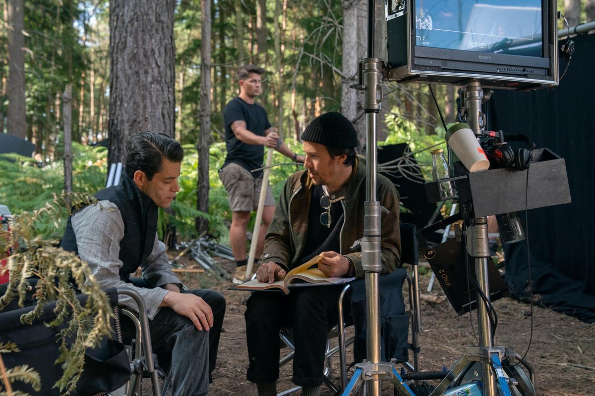 Rami Malek and director Cary Joji Fukunaga on the set of “No Time To Die.” Cr: MGM