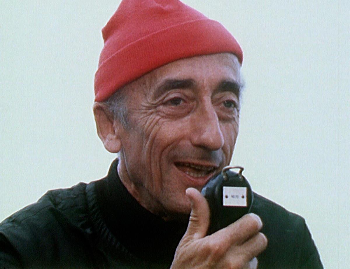 July 1969: Jacques Cousteau communicates by radio with a crew member exploring the ocean depths in one of the Calypso’s diving saucers in director Liz Garbus’ “Becoming Cousteau.” Cr: National Geographic