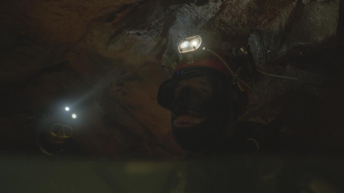 Divers surfaced in a cave in “The Rescue.” Cr: National Geographic