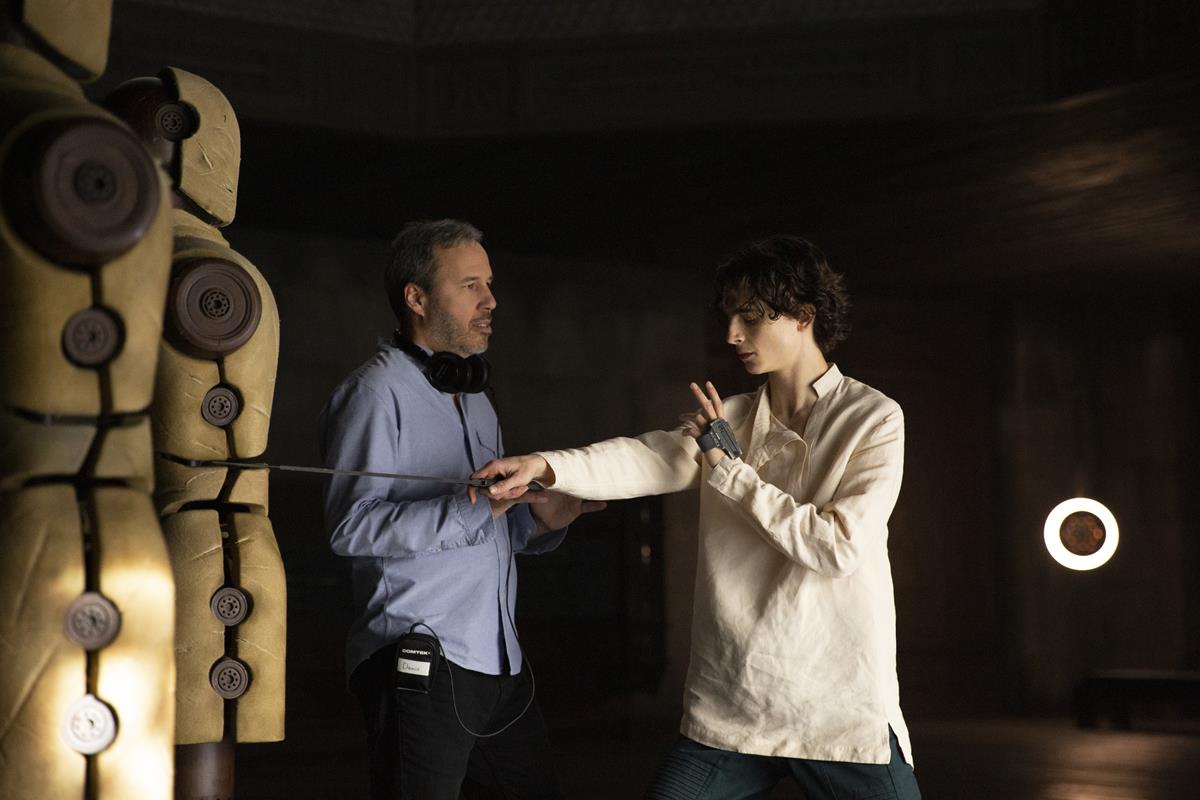 Director Denis Villeneuve and Timothée Chalamet on the set of “Dune.” Cr: Warner Bros