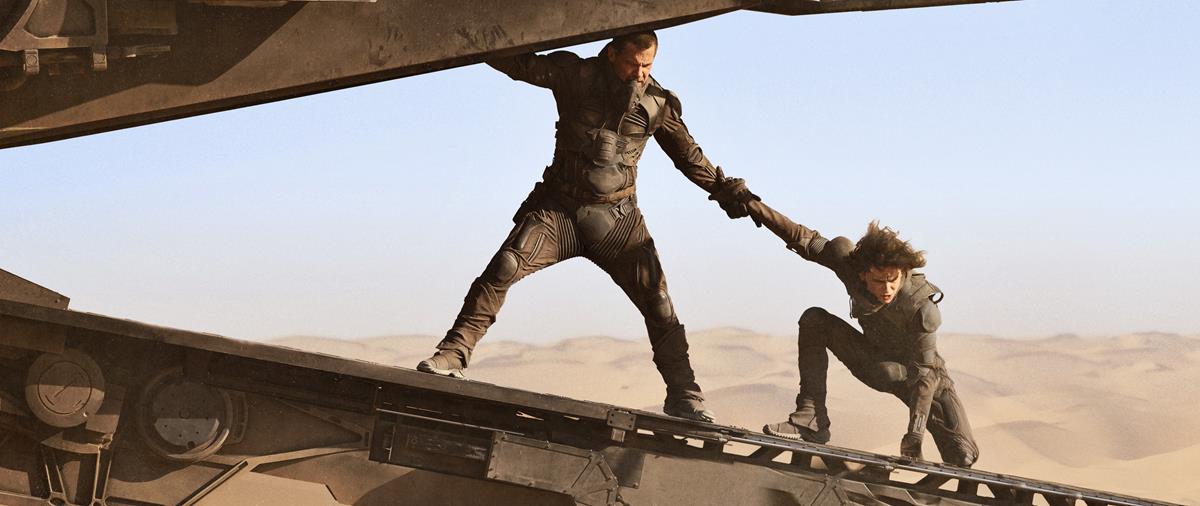 Josh Brolin as Gurney Halleck and Timothée Chalamet as Paul Atreides in director Denis Villeneuve’s “Dune.” Cr: Warner Bros