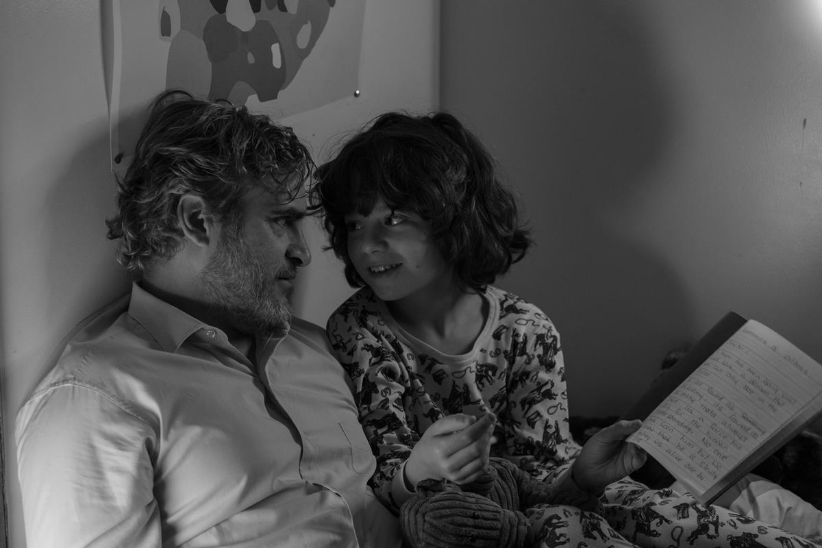 Joaquin Phoenix as Johnny and Woody Norman as Jesse in director Mike Mills’ “C’mon C’mon.” Cr: Tobin Yelland/A24