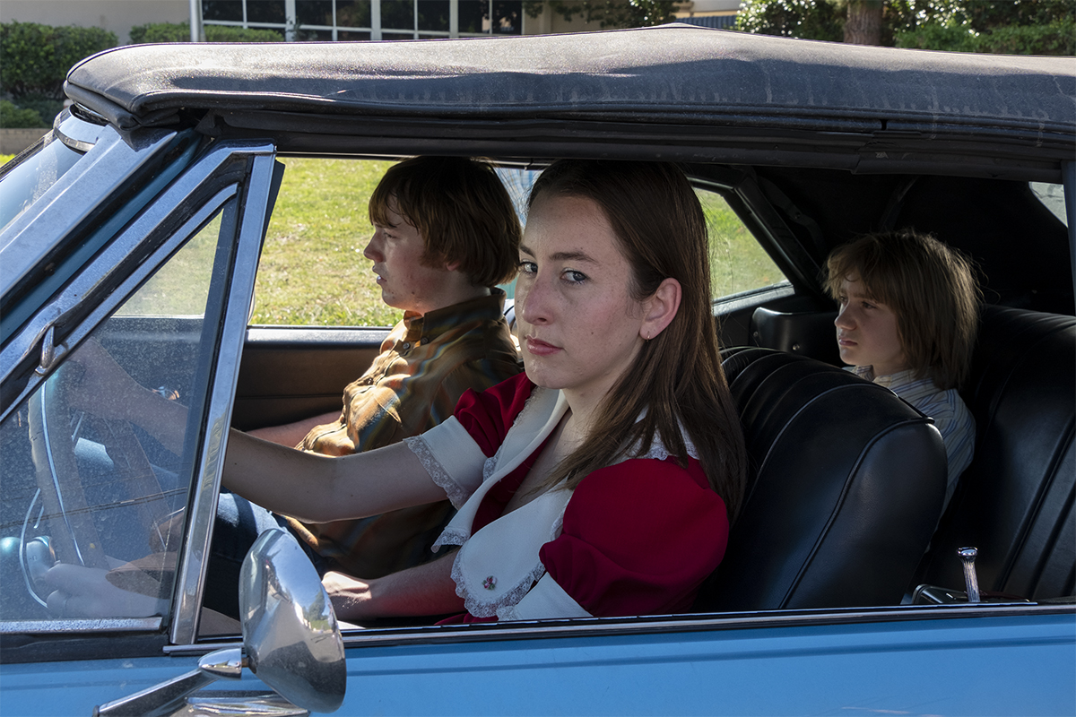 Alana Haim as Alana Kane and Cooper Hoffman as Gary Valentine in director Paul Thomas Anderson’s “Licorice Pizza.” Cr: MGM
