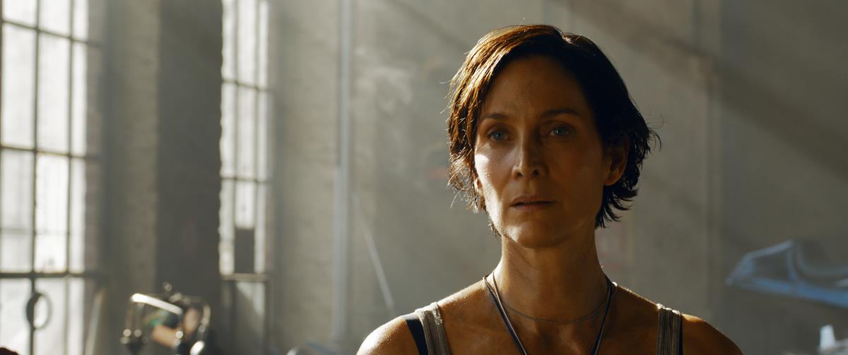 Carrie-Anne Moss as Trinity in director Lana Wachowski’s “The Matrix Resurrections.” Cr: Warner Bros. Pictures