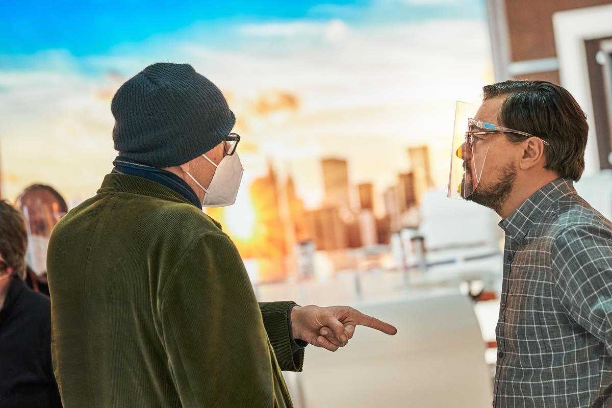 Director Adam McKay and Leonardo DiCaprio on the set of “Don’t Look Up.” Cr: Niko Tavernise/Netflix