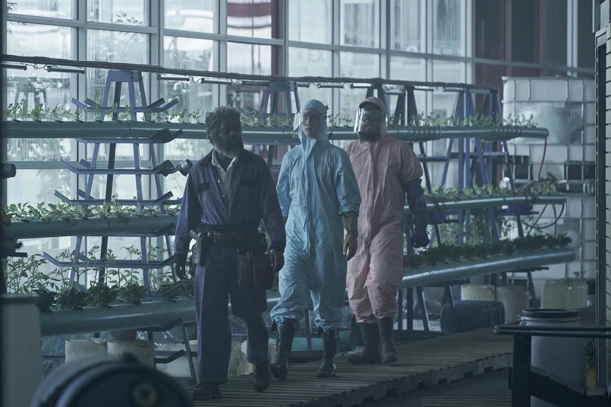 Milton Barnes as Miles, Mackenzie Davis as Kirsten Raymonde, and Daniel Zovatto as The Prophet in season 1 episode 8 of “Station Eleven.” Cr: Warner Media
