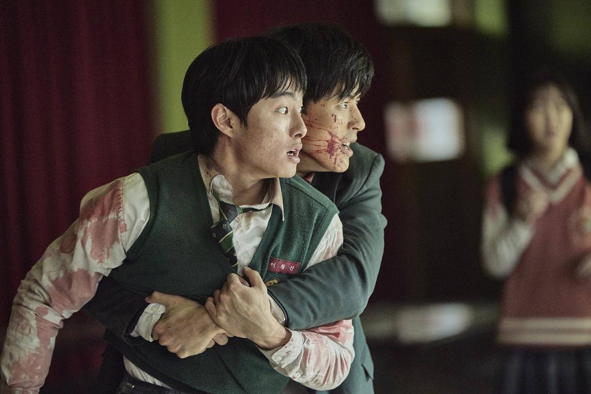 Yoon Chan-young as Lee Cheong-san and Park Solomon as Lee Su-hyeok in “All of Us Are Dead.” Cr: Yang Hae-sung/Netflix
