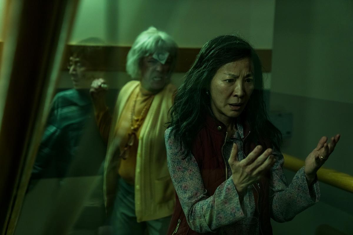 Jamie Lee Curtis as Deirdre Beaubeirdra and Michelle Yeoh as Evelyn Wang in “Everything Everywhere All at Once,” directed by Daniel Kwan and Daniel Scheinert. Cr: Allyson Riggs/A24