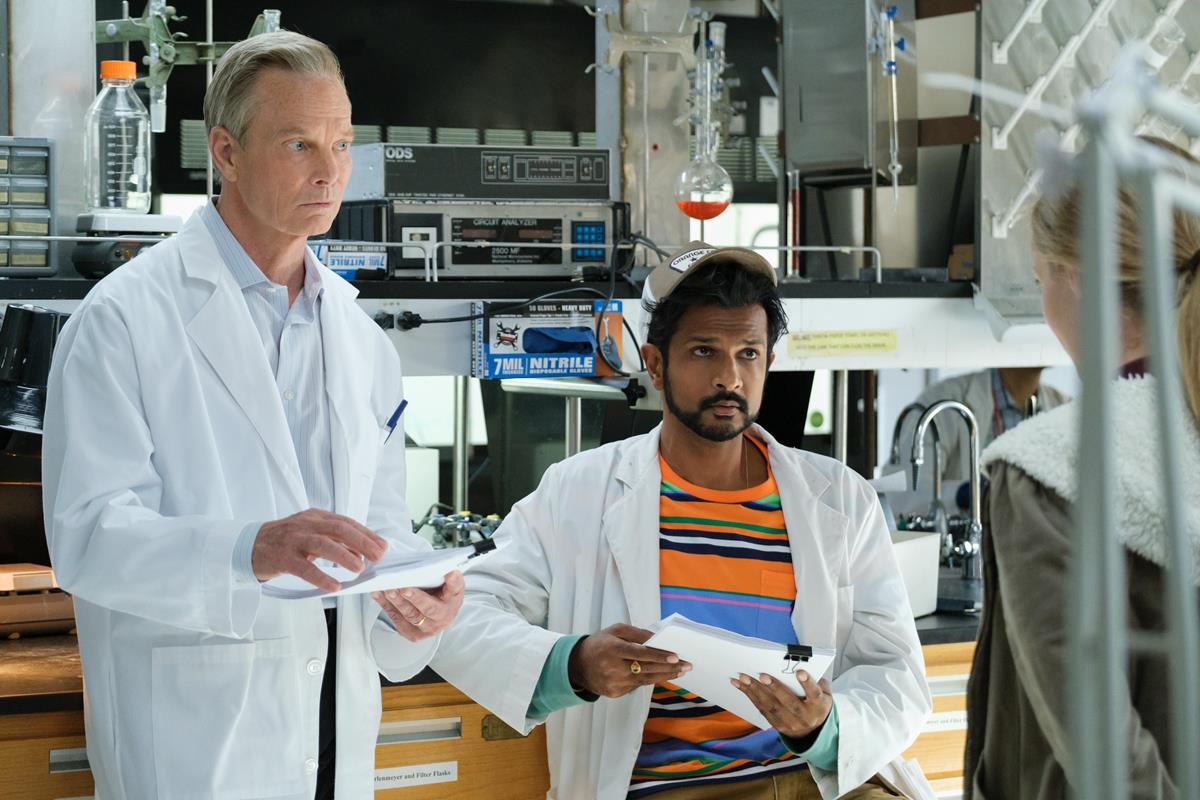 Bill Irwin as Channing Robertson and Utkarsh Ambudkar as Rakesh Madhava in episode 1 of “The Dropout.” Cr: Beth Dubber/Hulu