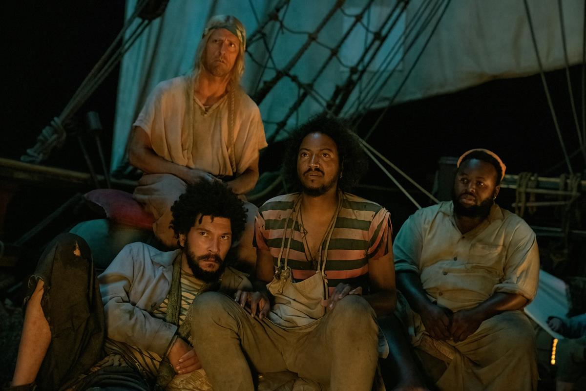 Joel Fry as Frenchie, Nat Faxon as The Swede, Samba Schutte as Roach, and Samson Kayo as Oluwande in season 1 episode 6 of “Our Flag Means Death.” Cr: Warner Media