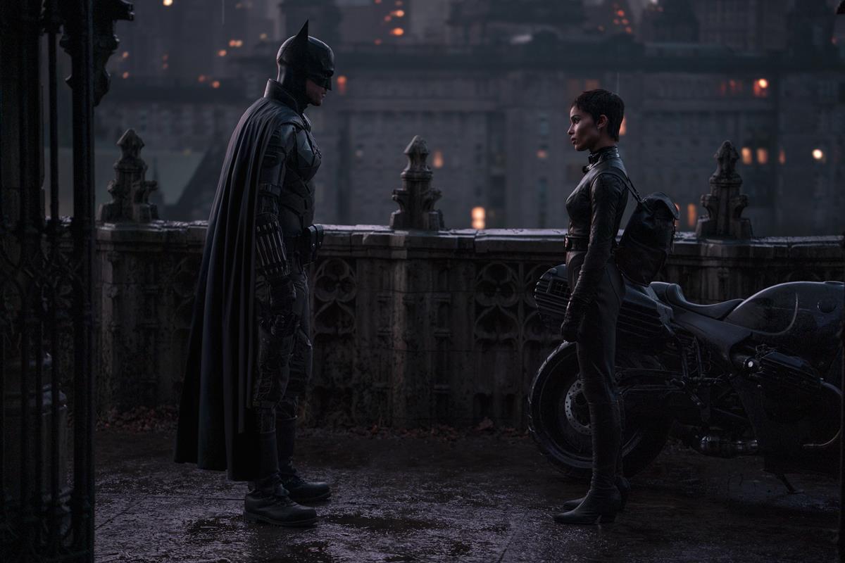 Robert Pattinson as Batman and Zoë Kravitz as Selina Kyle in director Matt Reeves’ “The Batman.” Cr: Jonathan Olley/Warner Bros. Pictures