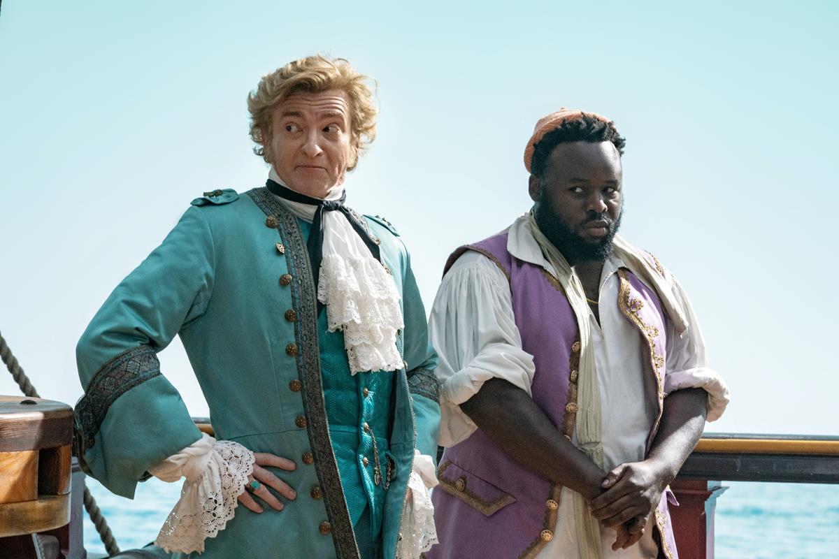 Rhys Darby as Stede Bonnet and Samson Kayo as Oluwande in season 1 episode 1 of “Our Flag Means Death.” Cr: Warner Media