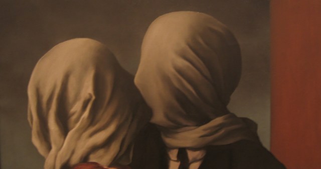René Magritte’s “The Lovers”