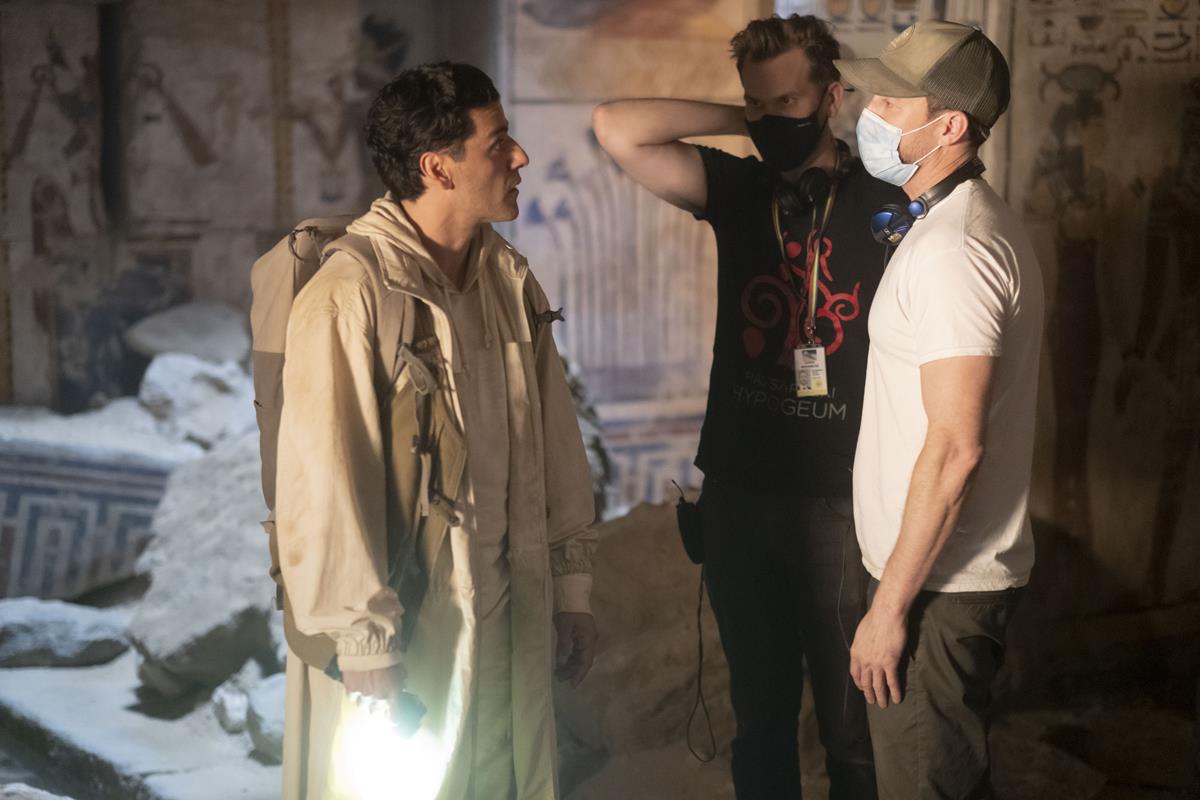 Oscar Isaac with directors Aaron Moorhead and Justin Benson on the set of “Moon Knight.” Cr: Marvel Studios