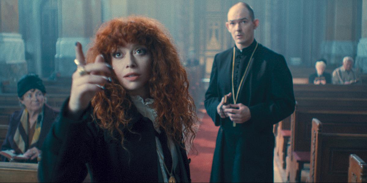 Natasha Lyonne as Nadia Vulvokov and Ákos Orosz as Father Laszlo in season 2 episode 5 of “Russian Doll.” Cr: Netflix