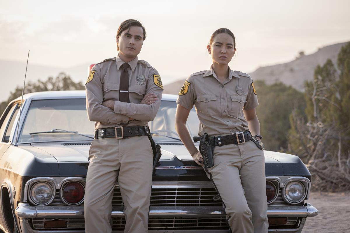 Kiowa Gordon as Jim Chee and Jessica Matten as Sgt. Bernadette Manuelito in season 1 of “Dark Winds.” Cr: AMC