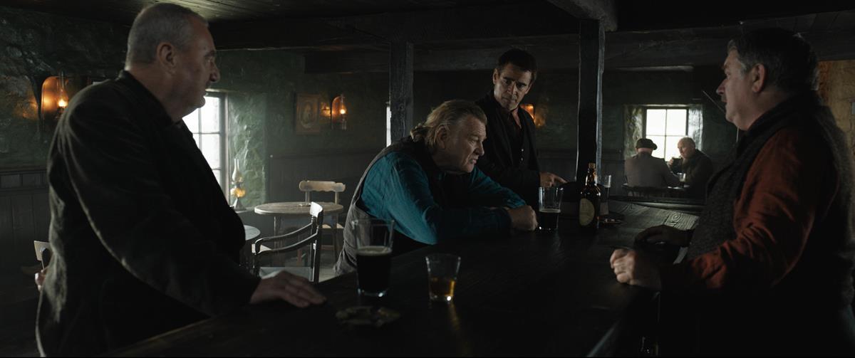 Jon Kenny as Gerry, Brendan Gleeson as Colm Doherty, Colin Farrell as Pádraic Súilleabháin, and Pat Shortt as Jonjo Devine in “The Banshees of Inisherin.” Cr: Searchlight Pictures