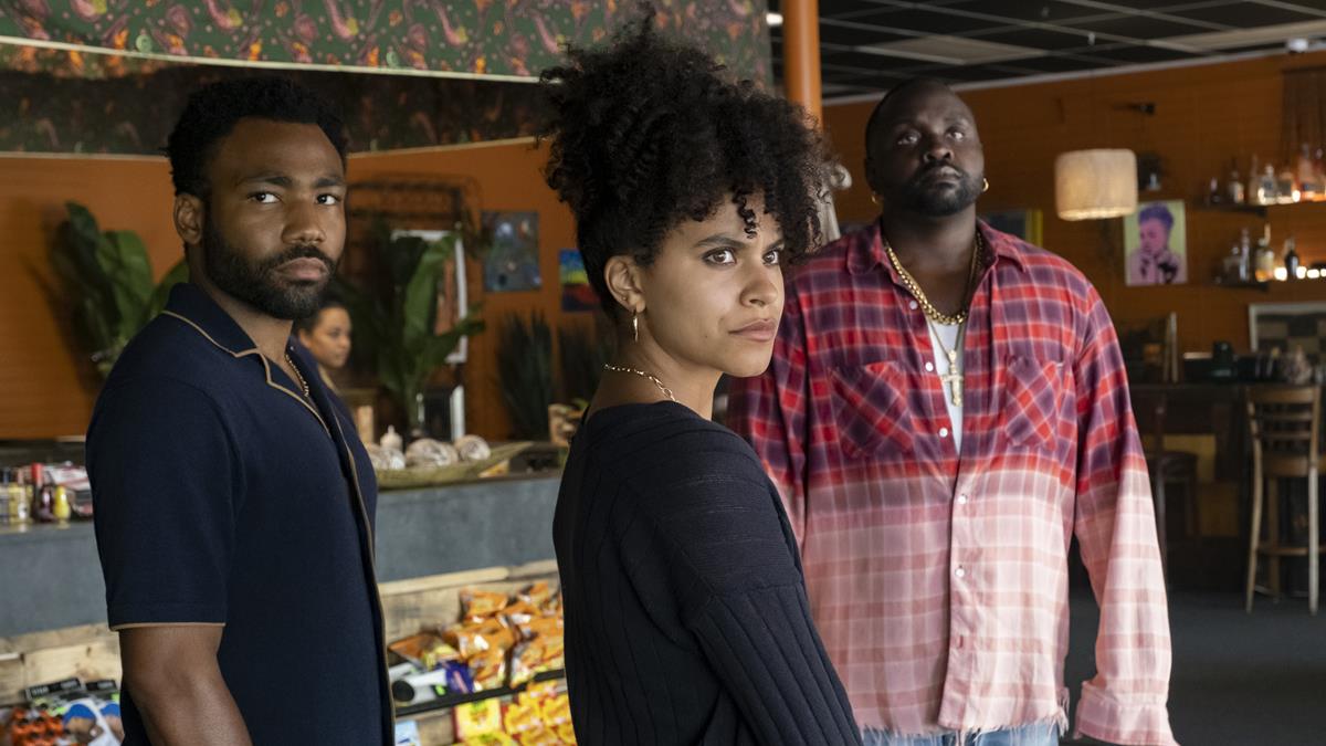 Glover as Earn Marks, Zazie Beetz as Van, and Brian Tyree Henry as Alfred “Paper Boi” Miles in the series finale of “Atlanta.” Cr: Guy D’Alema/FX