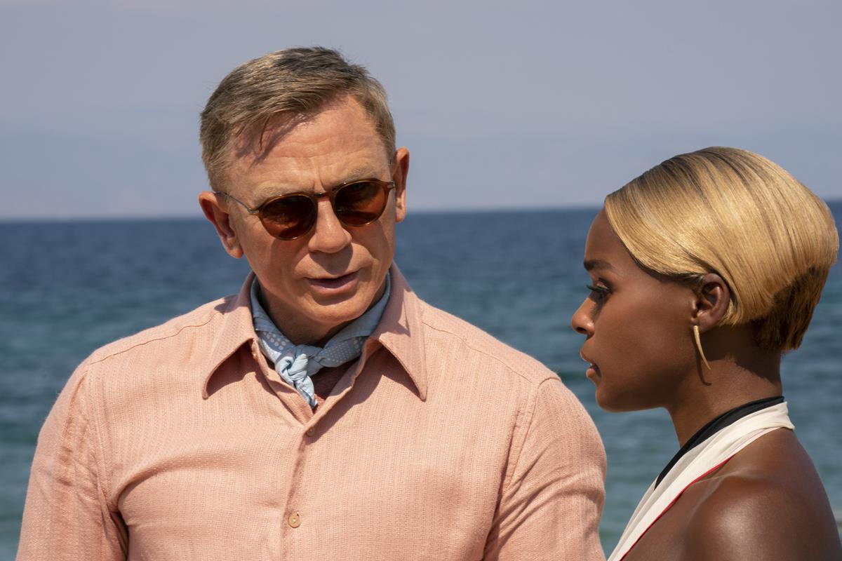 Daniel Craig as Detective Benoit Blanc and Janelle Monáe as Andi Brand in writer/director Rian Johnson’s “Glass Onion: A Knives Out Mystery.” Cr: John Wilson/Netflix