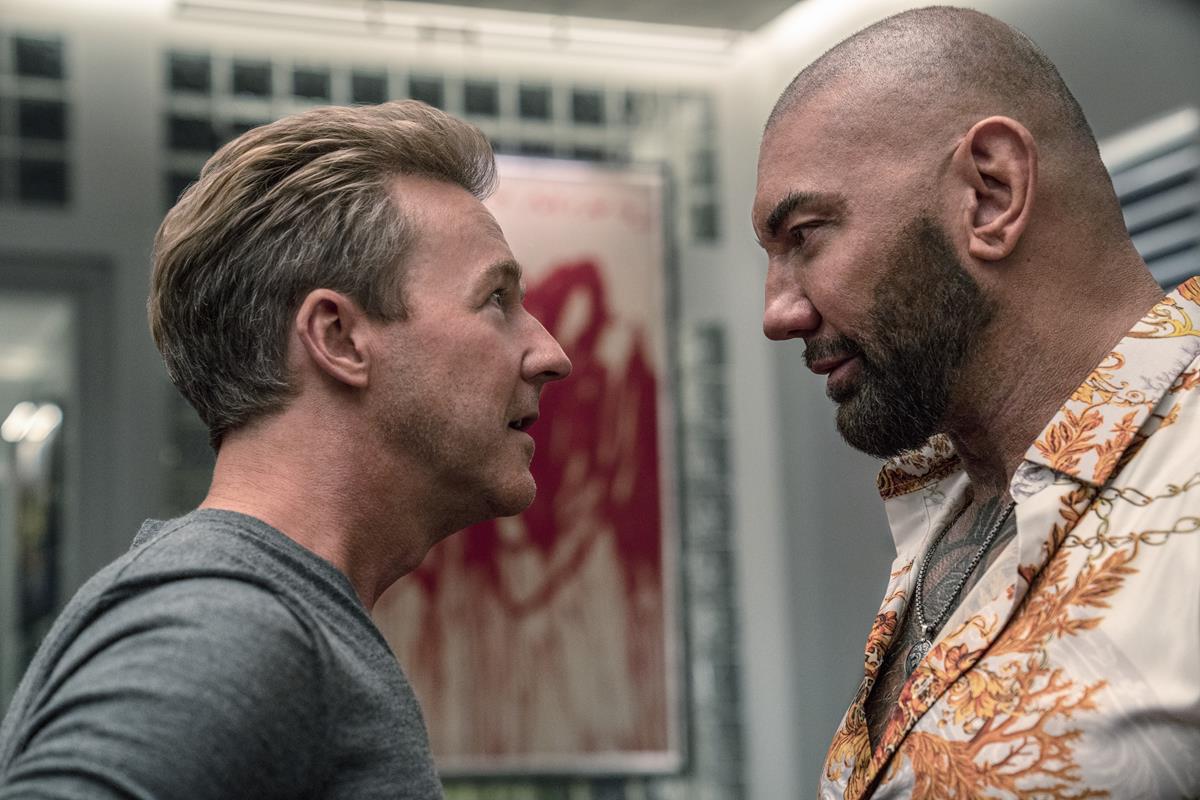Edward Norton as Miles Bron, and Dave Bautista as Duke Cody in writer/director Rian Johnson’s “Glass Onion: A Knives Out Mystery.” Cr: John Wilson/Netflix
