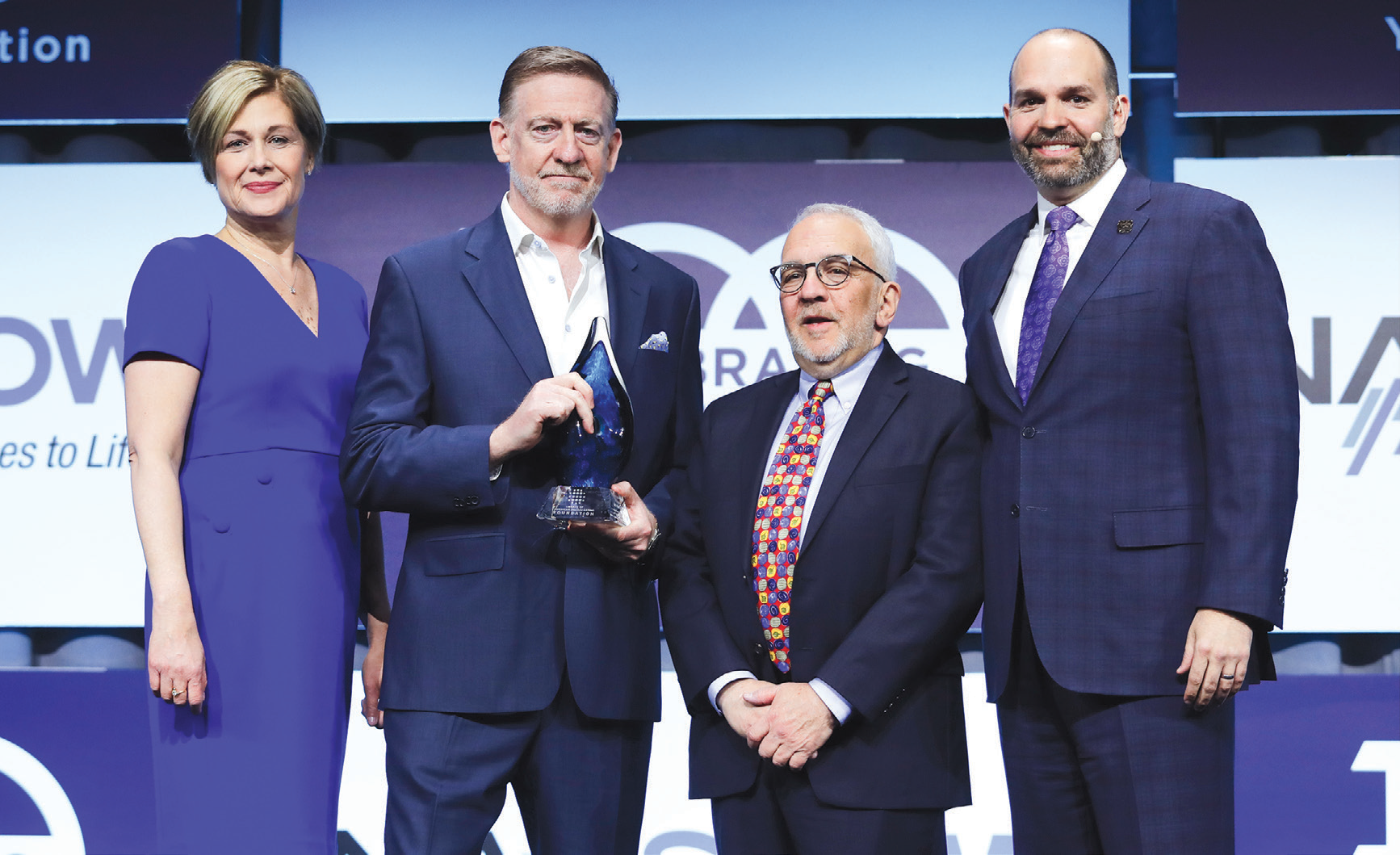 The Library of American Broadcasting Foundation’s second annual Insight Award to CBS newsmagazine “60 Minutes” during
Monday’s welcome session (from left): Session co-chair Heidi Raphael of the LABF; “60 Minutes” Executive Producer Bill Owens;
session co-chair Jack N. Goodman and NAB President and CEO Curtis LeGeyt.