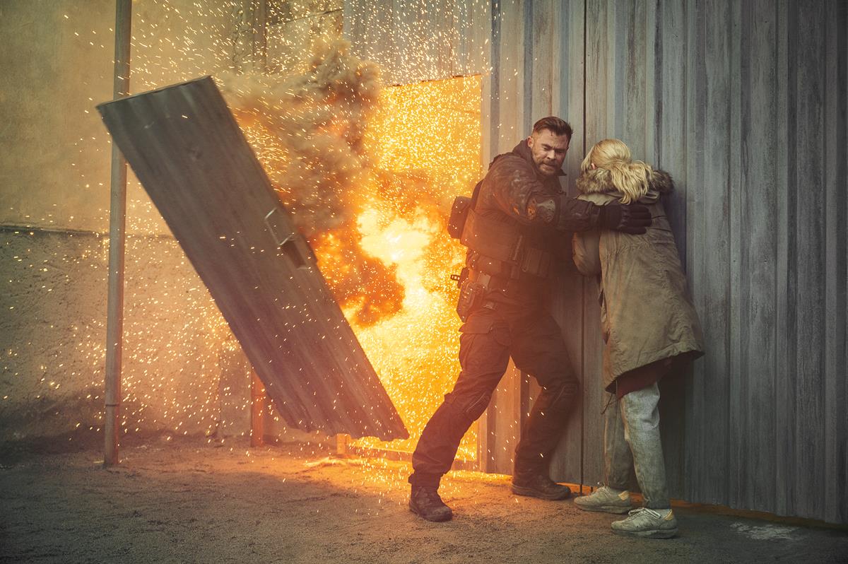 Chris Hemsworth as Tyler Rake and Tinatin Dalakishvili as Ketevan in “Extraction 2.” Cr: Jasin Boland/Netflix
