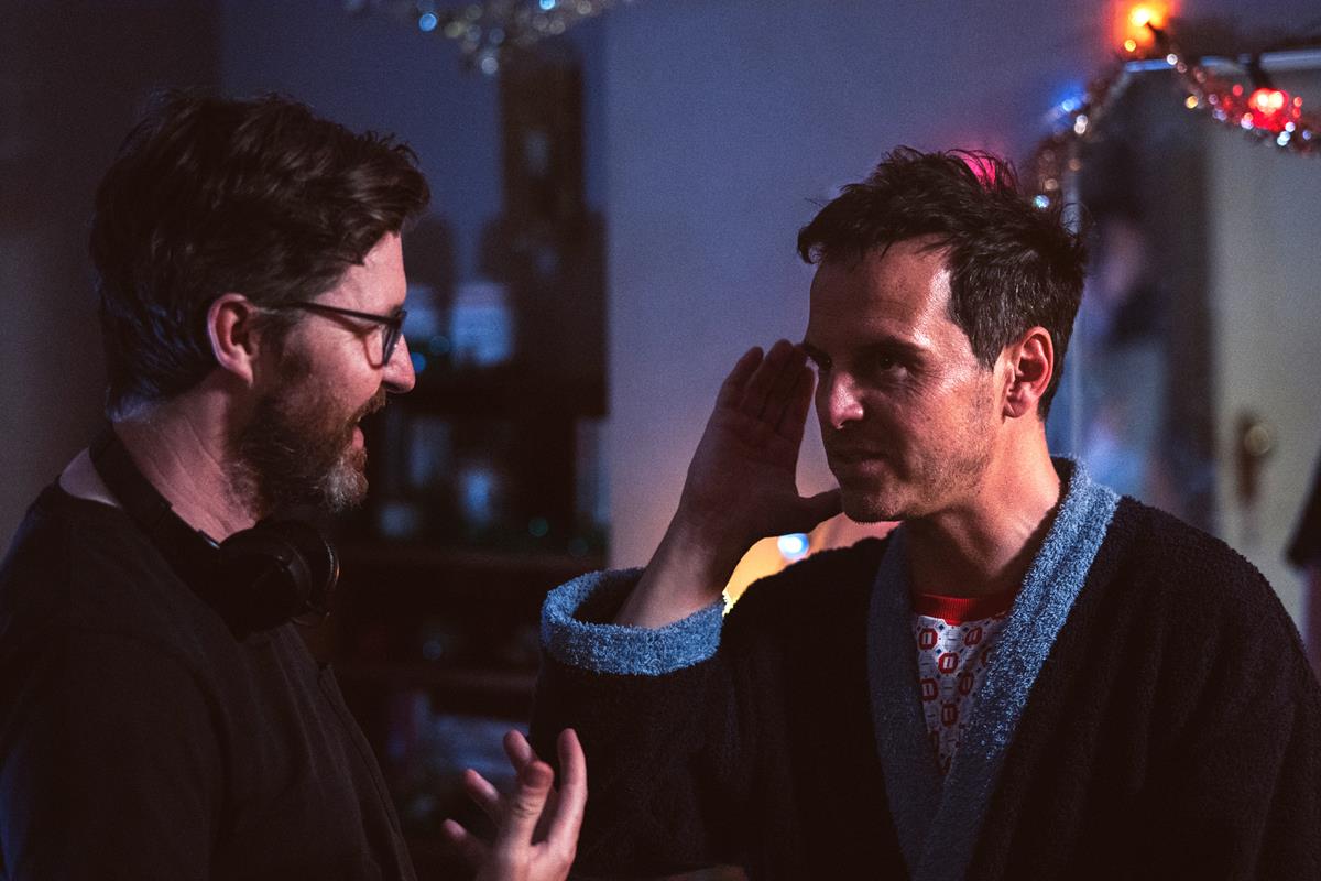 Director Andrew Haigh and Andrew Scott on the set of “All of Us Strangers.” Cr: Chris Harris/Searchlight Pictures