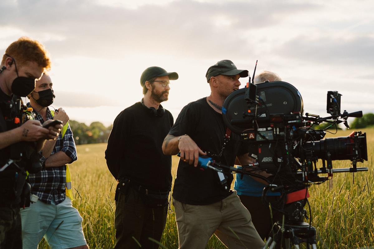 Director Andrew Haigh and DP Jamie Ramsay on the set of “All of Us Strangers.” Cr: Chris Harris/Searchlight Pictures