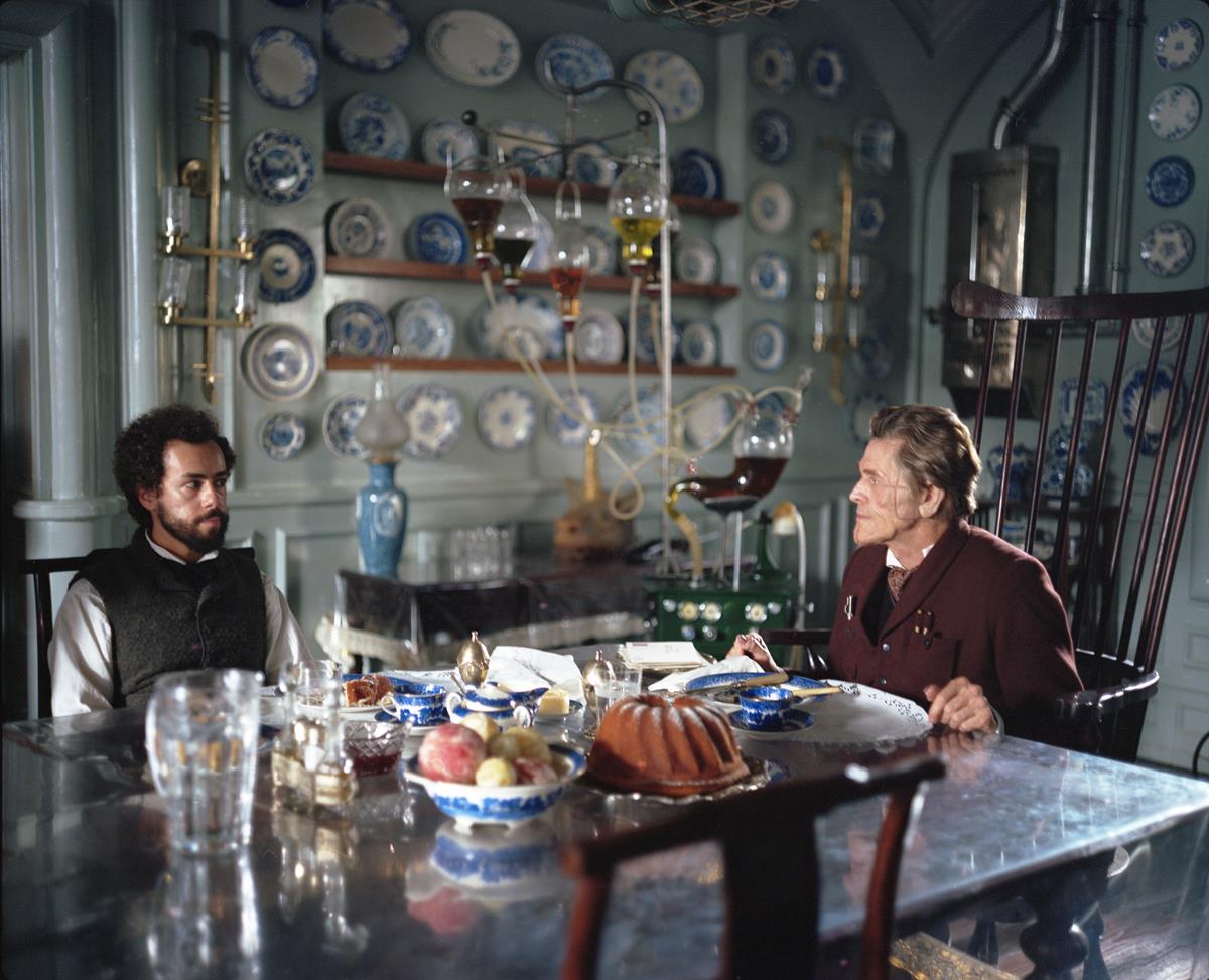 Ramy Youssef and Willem Dafoe in “Poor Things.” Cr: Yorgos Lanthimos/Searchlight Pictures
