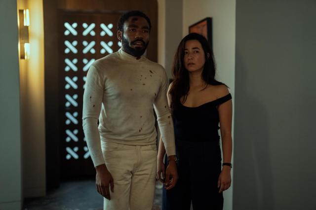 Donald Glover as John Smith and Maya Erskine as Jane Smith in “Mr. & Mrs. Smith.” Cr: David Lee/Amazon Prime