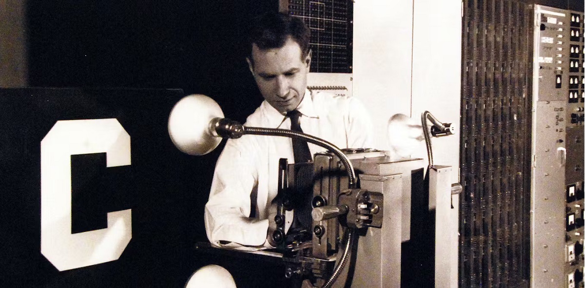 Frank Rosenblatt with the Mark I Perceptron, the first artificial neural network computer, unveiled in 1958. Cr: National Museum of the US Navy/Flickr
