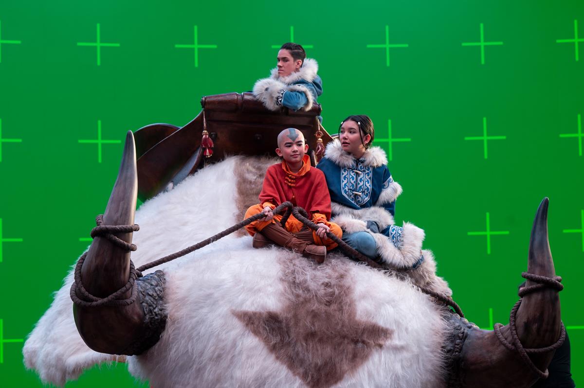 Ian Ousley as Sokka, Gordon Cormier as Aang, Kiawentiio as Katara behind the scenes of season 1 of Avatar: The Last Airbender. Cr. Robert Falconer/Netflix © 2024
