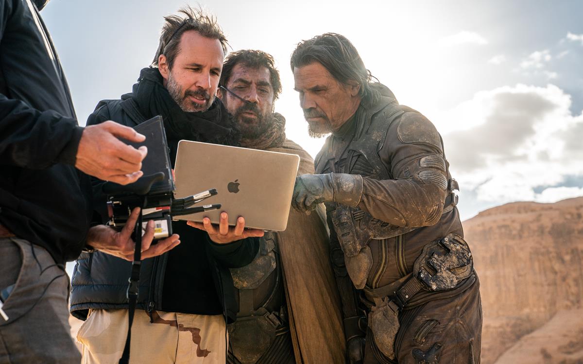 Denis Villeneuve, Javier Bardem and Josh Brolin on the set of “Dune: Part Two.” Cr: Niko Tavernise/Warner Bros. Pictures