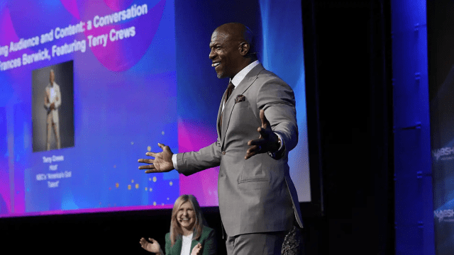 NBCUniversal Entertainment chairman Frances Berwick with Terry Crews at NAB Show