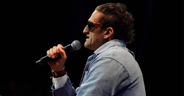 Casey Neistat (and his signature sunglasses) address the Main Stage crowd at the 2024 NAB Show.